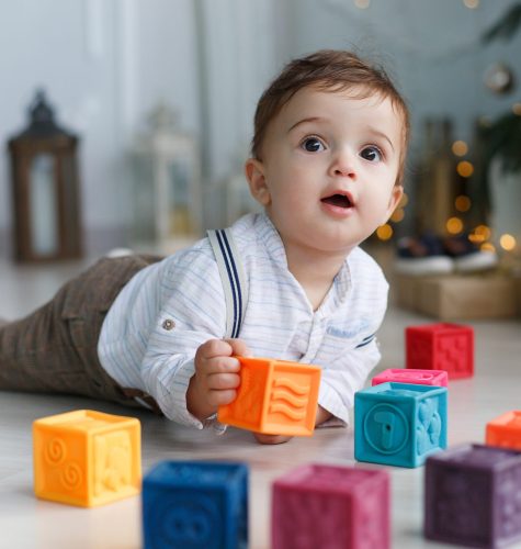 cute-baby-with-toys